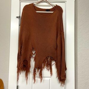 Distressed frayed sweater